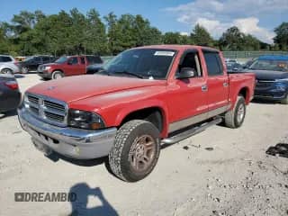 2003 Dodge Dakota SLT z VIN 1D7HG48NX3S122448, wystawiony jako Copart lot #69306905 z przebiegiem 201 755 mil mil oraz Szkoda całkowita • Salvage title. Historia ofert i sprzedaży dostępna na DreamBid. Obrazek 1.