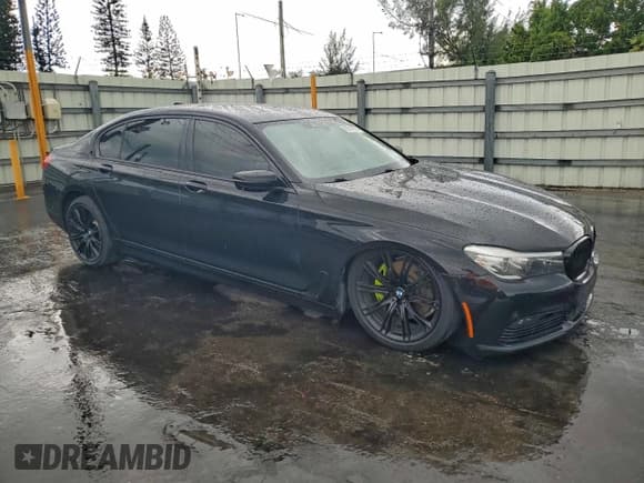 ✅ 2016 BMW 7 Series 740i • VIN: WBA7E2C51GG738729 • Lot: 95914555. Listed on Copart with 109,302 mi. Free auction sales archive from the USA and detailed vehicle history report at DreamBid. Image 4.