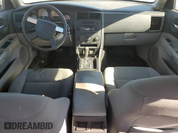 2007 Dodge Charger z VIN 2B3LA43R17H815228, wystawiony jako Copart lot #74640274 z przebiegiem 266 748 mil mil oraz Szkoda całkowita • Salvage title. Historia ofert i sprzedaży dostępna na DreamBid. Obrazek 8.