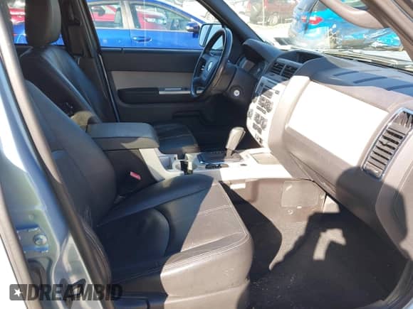 2009 Mercury Mariner Premier with VIN 4M2CU97739KJ14224, listed as a IAAI auction lot 43552437 with 103,277 mi miles and . Bid and sale history available at DreamBid. Image 5.