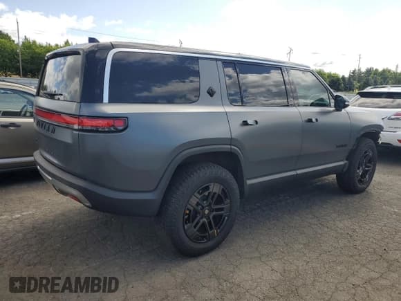 ✅ 2023 Rivian R1S Adventure • VIN: 7PDSGABA0PN018987 • Лот: 60968965. Опубликован ранее на Copart с пробегом 10 489 миль. Бесплатный доступ к архиву аукционных продаж из США и подробный отчёт об истории автомобиля на DreamBid. Изображение 3.