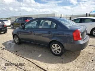 2009 Hyundai Accent Auto GLS z VIN KMHCN46C59U302439, wystawiony jako Copart lot #73185974 z przebiegiem 97 742 mil mil oraz Szkoda całkowita • Salvage title. Historia ofert i sprzedaży dostępna na DreamBid. Obrazek 2.