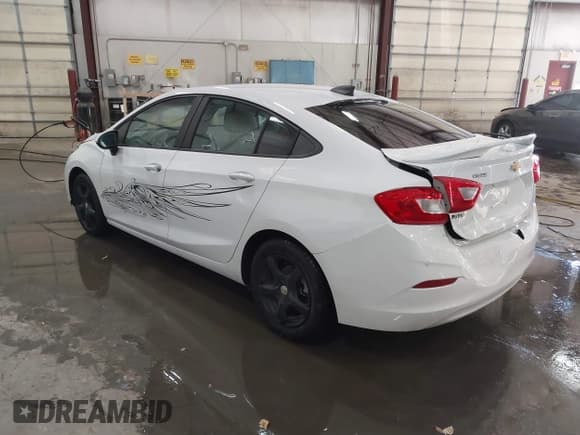 ✅ 2016 Chevrolet Cruze LS • VIN: 1G1BB5SMXG7272517 • Lot: 41283610. Listed on IAAI with 57,497 mi. Free auction sales archive from the USA and detailed vehicle history report at DreamBid. Image 3.