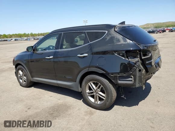 ✅ 2018 Hyundai Santa Fe 2.4L • VIN: 5XYZUDLB0JG559611 • Lot: 52118463. Listed on Copart with 58,098 mi. Free auction sales archive from the USA and detailed vehicle history report at DreamBid. Image 2.