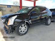 ✅ 2013 Cadillac SRX • VIN: 3GYFNAE31DS556525 • Lot: 42787544. Listed on IAAI with 123,625 mi. Free auction sales archive from the USA and detailed vehicle history report at DreamBid. Image 2.