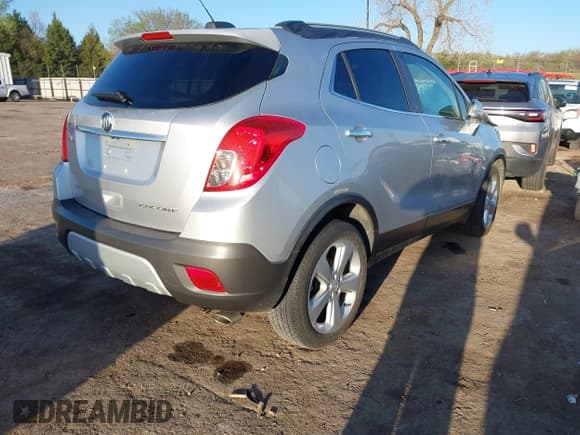 ✅ 2015 Buick Encore • VIN: KL4CJASB5FB167105 • Lot: 42002795. Listed on IAAI with 68,251 mi. Free auction sales archive from the USA and detailed vehicle history report at DreamBid. Image 4.