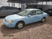 ✅ 1998 Ford Contour LX • VIN: 1FAFP66LXWK197384 • Lot: 51519385. Listed on Copart with 56,958 mi. Free auction sales archive from the USA and detailed vehicle history report at DreamBid. Image 1.