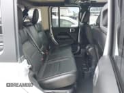 ✅ 2023 Jeep Wrangler Sahara • VIN: 1C4JJXP65PW696141 • Lot: 43364969. Listed on IAAI with 31,704 mi. Free auction sales archive from the USA and detailed vehicle history report at DreamBid. Image 18.