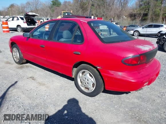 ✅ 1998 Pontiac Sunfire • VIN: 1G2JB52T2W7500314 • Lot: 41845503. Listed on IAAI with 131,957 mi. Free auction sales archive from the USA and detailed vehicle history report at DreamBid. Image 3.
