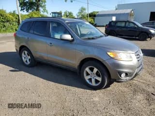 ✅ 2011 Hyundai Santa Fe GLS • VIN: 5XYZGDAG9BG055484 • Lot: 67952784. Listed on Copart with 179,708 mi. Free auction sales archive from the USA and detailed vehicle history report at DreamBid. Image 4.