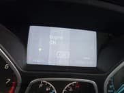 ✅ 2014 Ford Focus SE • VIN: 1FADP3K2XEL120056 • Lot: 43589905. Wystawiony na IAAI z przebiegiem 199 674 mil. Bezpłatny archiwum sprzedaży aukcyjnych z USA i szczegółowy raport historii pojazdu na DreamBid. Zdjęcie 7.