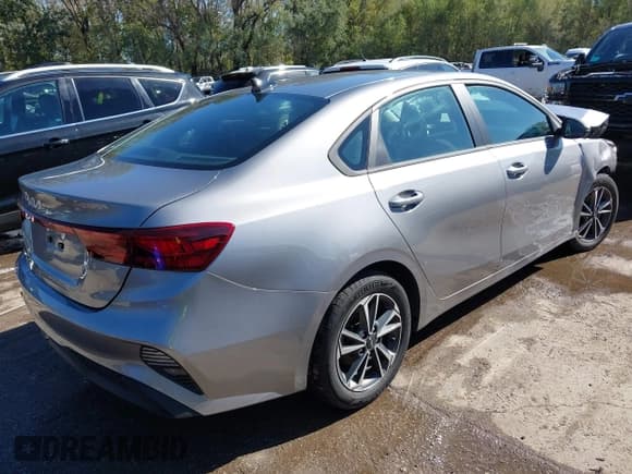 ✅ 2023 Kia Forte LXS • VIN: 3KPF24AD6PE685670 • Lot: 43520081. Listed on IAAI with 38,544 mi. Free auction sales archive from the USA and detailed vehicle history report at DreamBid. Image 4.