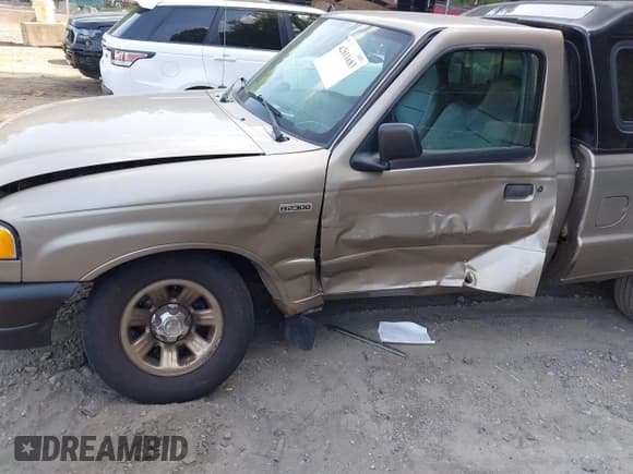 ✅ 2003 Mazda B-Series SX • VIN: 4F4YR12D13TM20598 • Lot: 42811683. Listed on IAAI with Not provided. Free auction sales archive from the USA and detailed vehicle history report at DreamBid. Image 6.