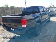 ✅ 2016 Toyota Tacoma SR5 • VIN: 5TFAX5GN4GX060296 • Lot: 42158554. Listed on IAAI with 219,859 mi. Free auction sales archive from the USA and detailed vehicle history report at DreamBid. Image 4.