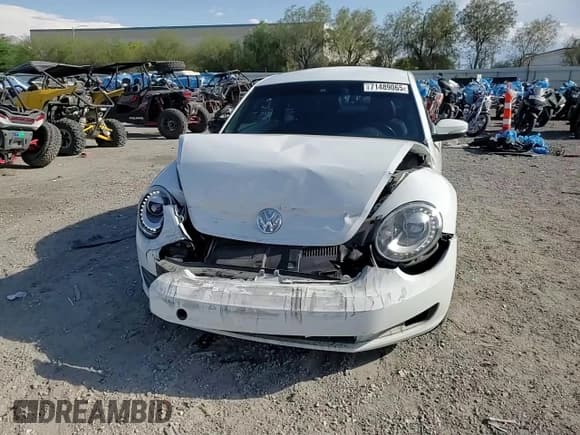 ✅ 2016 Volkswagen Beetle SE • VIN: 3VWJ17AT8GM633689 • Lot: 71489065. Listed on Copart with 78,346 mi. Free auction sales archive from the USA and detailed vehicle history report at DreamBid. Image 13.