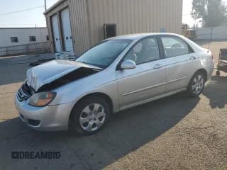 ✅ 2009 Kia Spectra LX • VIN: KNAFE221695650896 • Lot: 67799295. Listed on Copart with 189,121 mi. Free auction sales archive from the USA and detailed vehicle history report at DreamBid. Image 1.