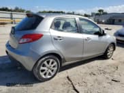 ✅ 2013 Mazda 2 Touring • VIN: JM1DE1LY7D0160988 • Лот: 77275474. Опубликован ранее на Copart с пробегом 106 080 миль. Бесплатный доступ к архиву аукционных продаж из США и подробный отчёт об истории автомобиля на DreamBid. Изображение 3.