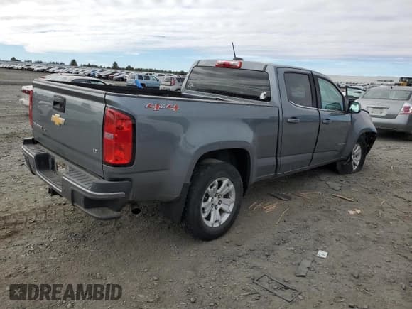 ✅ 2019 Chevrolet Colorado 4WD LT • VIN: 1GCGTCEN2K1151303 • Лот: 72614154. Опубликован ранее на Copart с пробегом 52 064 миль. Бесплатный доступ к архиву аукционных продаж из США и подробный отчёт об истории автомобиля на DreamBid. Изображение 3.