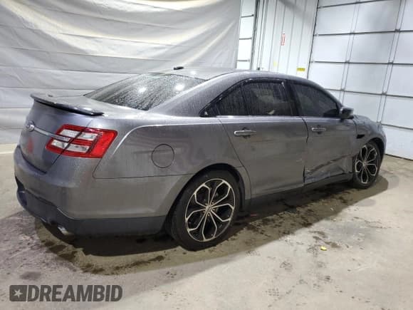 ✅ 2013 Ford Taurus SHO • VIN: 1FAHP2KT9DG139967 • Лот: 90393515. Опубликован ранее на Copart с пробегом 128 882 миль. Бесплатный доступ к архиву аукционных продаж из США и подробный отчёт об истории автомобиля на DreamBid. Изображение 3.