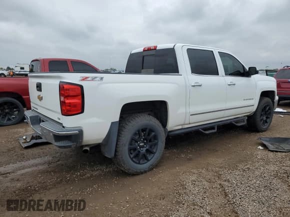 ✅ 2015 Chevrolet Silverado 1500 LTZ • VIN: 3GCUKSEJ7FG338198 • Lot: 82317195. Listed on Copart with 119,785 mi. Free auction sales archive from the USA and detailed vehicle history report at DreamBid. Image 3.
