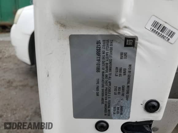 2007 Chevrolet Malibu 1LS z VIN 1G1ZS58F77F101866, wystawiony jako Copart lot #83723444 z przebiegiem 72 762 mil mil oraz Szkoda całkowita • Salvage title. Historia ofert i sprzedaży dostępna na DreamBid. Obrazek 12.