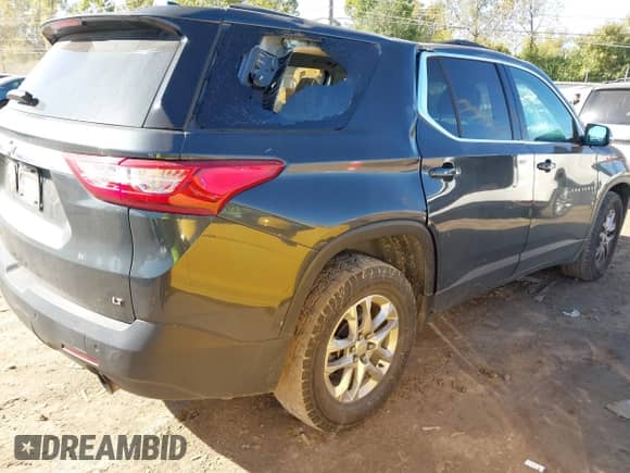 2020 Chevrolet Traverse LT Cloth z VIN 1GNERGKW4LJ264172, wystawiony jako IAAI lot #43436543 z przebiegiem 136 745 mil mil oraz . Historia ofert i sprzedaży dostępna na DreamBid. Obrazek 4.