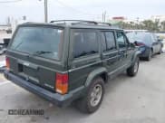 ✅ 1996 Jeep Cherokee Sport • VIN: 1J4FT68S6TL267408 • Lot: 42385629. Listed on IAAI with 268,753 mi. Free auction sales archive from the USA and detailed vehicle history report at DreamBid. Image 4.