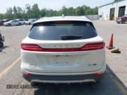 ✅ 2016 Lincoln MKC Select • VIN: 5LMTJ2DH9GUJ12832 • Lot: 42924982. Listed on IAAI with 124,059 mi. Free auction sales archive from the USA and detailed vehicle history report at DreamBid. Image 17.