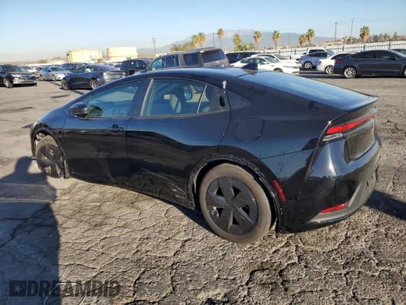 2025 Toyota Prius LE с VIN JTDACAAU8S3059589, выставлен на аукционе Copart как лот 72100945 с пробегом 14 715 миль миль и Списание • Salvage title. История ставок и продаж доступна на DreamBid. Изображение 2.