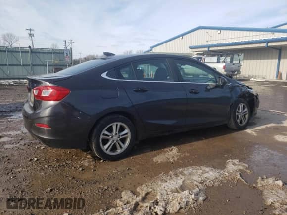 2017 Chevrolet Cruze LT z VIN 1G1BE5SM9H7144732, wystawiony jako Copart lot #68511212 z przebiegiem 92 582 mil mil oraz . Historia ofert i sprzedaży dostępna na DreamBid. Obrazek 3.