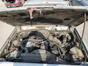 ✅ 1985 Jeep Cherokee • VIN: 1JCWB7742FT144063 • Lot: 84050844. Wystawiony na Copart z przebiegiem 80 072 mil. Bezpłatny archiwum sprzedaży aukcyjnych z USA i szczegółowy raport historii pojazdu na DreamBid. Zdjęcie 11.