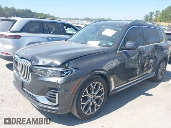 ✅ 2020 BMW X7 xDrive40i • VIN: 5UXCW2C04L9A03438 • Лот: 43187346. Опубликован ранее на IAAI с пробегом 102 740 миль. Бесплатный доступ к архиву аукционных продаж из США и подробный отчёт об истории автомобиля на DreamBid. Изображение 2.