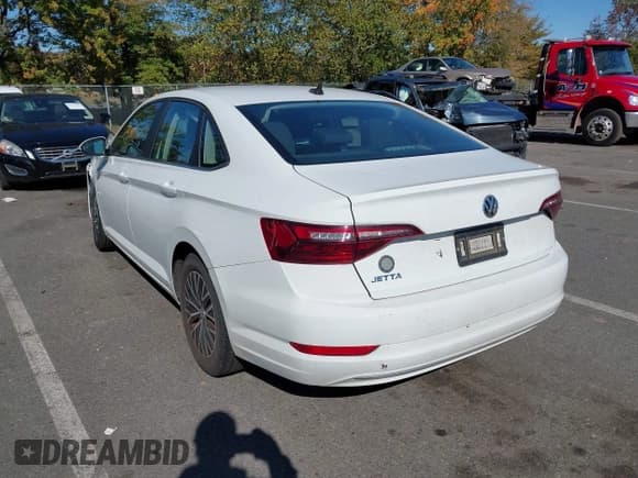 ✅ 2021 Volkswagen Jetta S • VIN: 3VWC57BU6MM015156 • Lot: 43407215. Listed on IAAI with 130,320 mi. Free auction sales archive from the USA and detailed vehicle history report at DreamBid. Image 3.