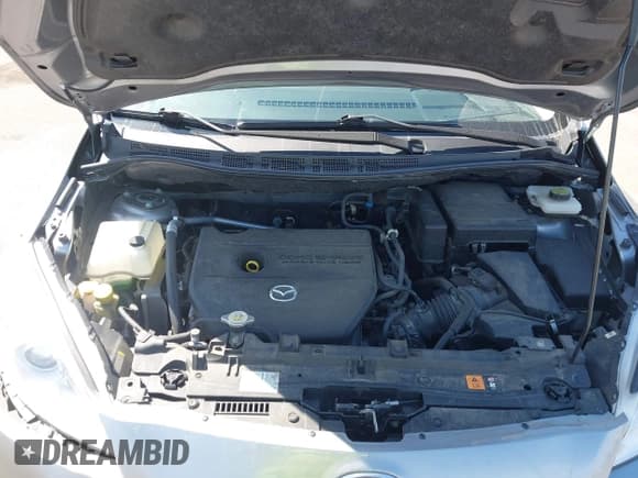 ✅ 2015 Mazda 5 Sport • VIN: JM1CW2BL8F0190878 • Lot: 42163330. Listed on IAAI with 50,237 mi. Free auction sales archive from the USA and detailed vehicle history report at DreamBid. Image 10.