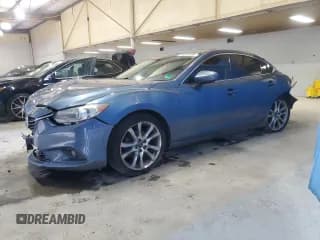 ✅ 2014 Mazda 6 i Grand Touring • VIN: JM1GJ1W53E1108554 • Lot: 80614055. Listed on Copart with 139,565 mi. Free auction sales archive from the USA and detailed vehicle history report at DreamBid. Image 1.