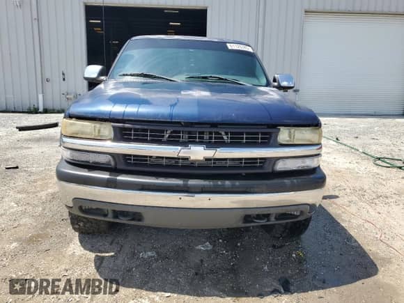 2002 Chevrolet Silverado 1500 LS z VIN 1GCEK14V72Z141352, wystawiony jako Copart lot #61126385 z przebiegiem 200 690 mil mil oraz Szkoda całkowita • Salvage title. Historia ofert i sprzedaży dostępna na DreamBid. Obrazek 5.