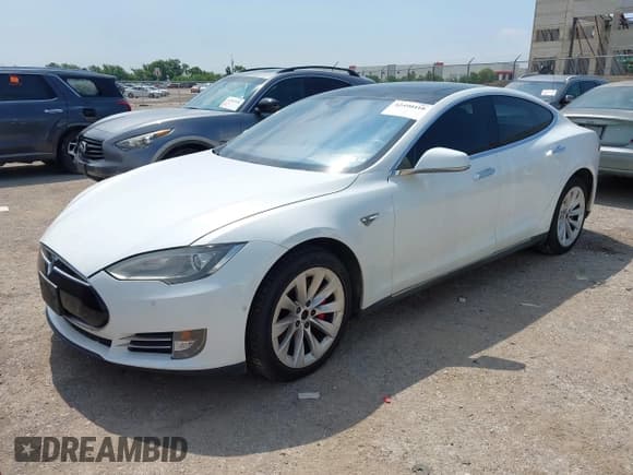 ✅ 2014 Tesla Model S P85D • VIN: 5YJSA1H21EFP68208 • Lot: 42490416. Listed on IAAI with 153,973 mi. Free auction sales archive from the USA and detailed vehicle history report at DreamBid. Image 18.