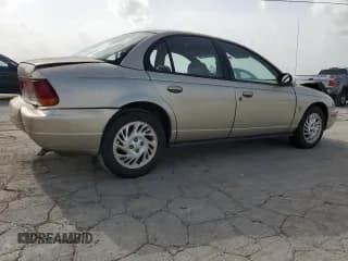 ✅ 1998 Saturn SL • VIN: 1G8ZK5270WZ240303 • Лот: 65364164. Опубликован ранее на Copart с пробегом 156 699 миль. Бесплатный доступ к архиву аукционных продаж из США и подробный отчёт об истории автомобиля на DreamBid. Изображение 3.