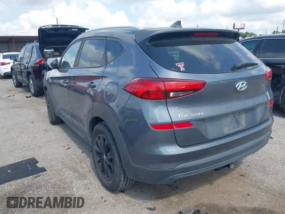 2019 Hyundai Tucson Value with VIN KM8J33A49KU955529, listed as a IAAI auction lot 42947554 with 81,614 mi miles and . Bid and sale history available at DreamBid. Image 3.