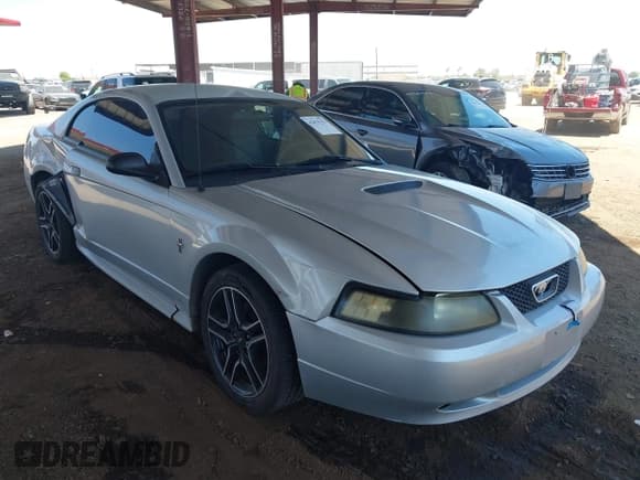 ✅ 2002 Ford Mustang Standard • VIN: 1FAFP404X2F143723 • Lot: 42479151. Listed on IAAI with 160,810 mi. Free auction sales archive from the USA and detailed vehicle history report at DreamBid. Image 1.