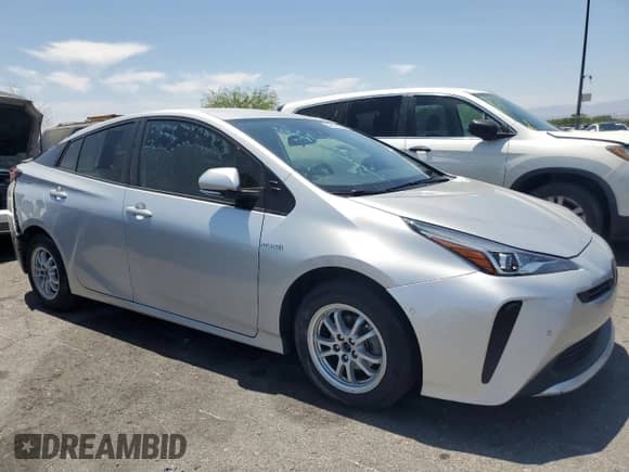 2021 Toyota Prius L Eco with VIN JTDKAMFU3M3148283, listed as a Copart auction lot 58578225 with 89,944 mi miles and Salvage title. Bid and sale history available at DreamBid. Image 4.