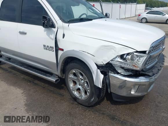 ✅ 2016 Ram 1500 Laramie • VIN: 1C6RR7NM6GS337733 • Лот: 43182554. Опубликован ранее на IAAI с пробегом 223 897 миль. Бесплатный доступ к архиву аукционных продаж из США и подробный отчёт об истории автомобиля на DreamBid. Изображение 18.