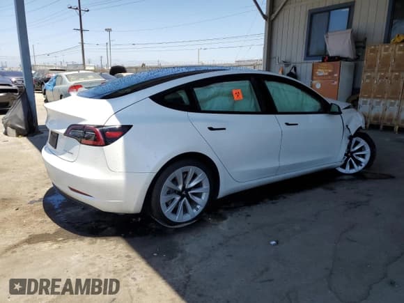 ✅ 2022 Tesla Model 3 Long Range • VIN: 5YJ3E1EB1NF128500 • Лот: 66383225. Опубликован ранее на Copart с пробегом 42 681 миль. Бесплатный доступ к архиву аукционных продаж из США и подробный отчёт об истории автомобиля на DreamBid. Изображение 3.