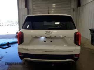 2020 Hyundai Palisade SEL с VIN KM8R4DHE1LU088388, выставлен на аукционе Copart как лот 74095624 с пробегом 105 906 миль миль и Списание • Salvage title. История ставок и продаж доступна на DreamBid. Изображение 6.