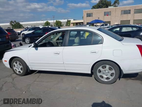 2003 Hyundai Elantra GLS with VIN KMHDN45D13U567025, listed as a IAAI auction lot 43400927 with 123,580 mi miles and . Bid and sale history available at DreamBid. Image 14.