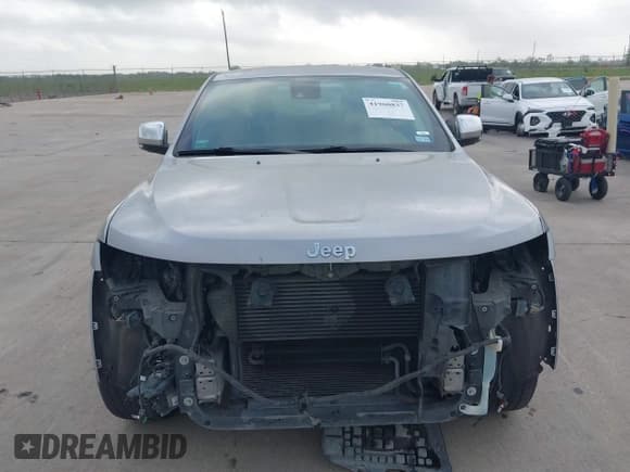 ✅ 2015 Jeep Grand Cherokee Overland • VIN: 1C4RJFCMXFC725683 • Lot: 41960837. Listed on IAAI with 117,200 mi. Free auction sales archive from the USA and detailed vehicle history report at DreamBid. Image 12.