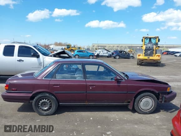 ✅ 1991 Toyota Camry • VIN: 4T1VV22E5MU051774 • Lot: 42080078. Wystawiony na IAAI z przebiegiem 105 149 mil. Bezpłatny archiwum sprzedaży aukcyjnych z USA i szczegółowy raport historii pojazdu na DreamBid. Zdjęcie 13.