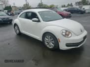 ✅ 2013 Volkswagen Beetle 2.0L TDI • VIN: 3VWRL7AT1DM663576 • Lot: 81794675. Listed on Copart with 123,158 mi. Free auction sales archive from the USA and detailed vehicle history report at DreamBid. Image 13.