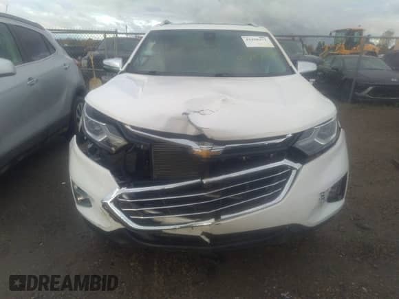 2020 Chevrolet Equinox Premier z VIN 3GNAXYEX3LS534571, wystawiony jako IAAI lot #43458472 z przebiegiem 116 711 mil mil oraz . Historia ofert i sprzedaży dostępna na DreamBid. Obrazek 6.