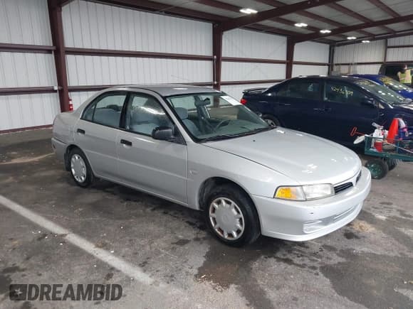 ✅ 2001 Mitsubishi Mirage ES • VIN: JA3AY26C91U036479 • Lot: 42422317. Listed on IAAI with 176,927 mi. Free auction sales archive from the USA and detailed vehicle history report at DreamBid. Image 1.